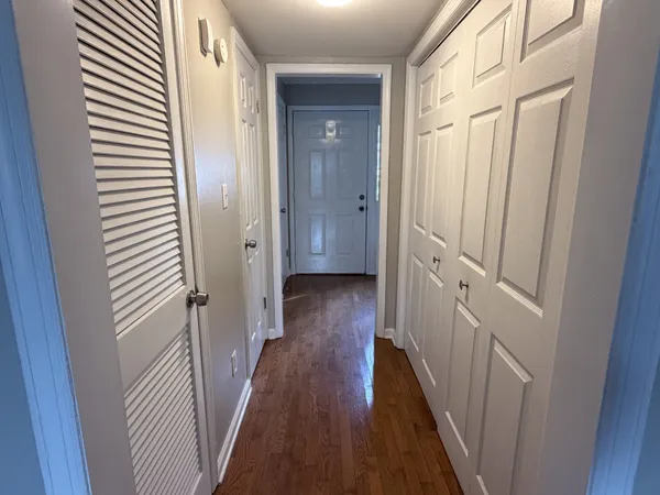 a view of a bathroom from the hallway