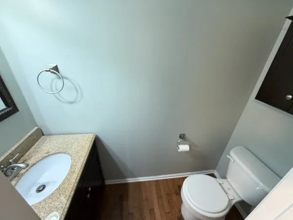 a bathroom with a sink and toilet