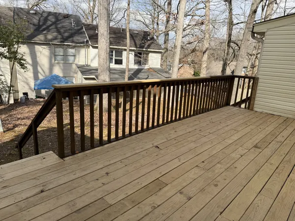 a kitchen with stainless steel appliances granite countertop a stove refrigerator sink and dishwasher