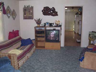 610 Blaine Road Granger, WA 98932 - Photo 2 of 9 a living room with furniture and a dresser