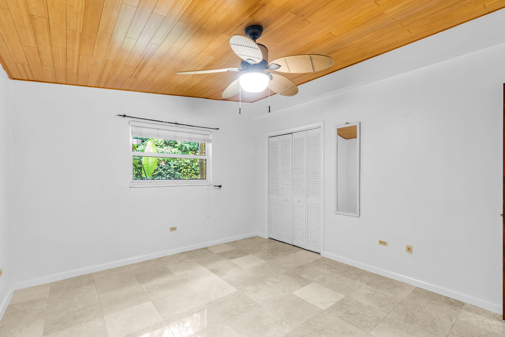 13 Bass Avenue Key Largo, FL 33037 - Photo 25 of 43 a view of an empty room with a window