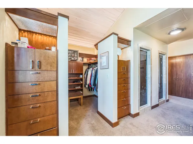 a bathroom with a sink double vanity and a shower