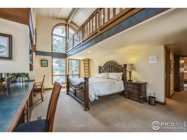 a bathroom with a toilet a sink and shower