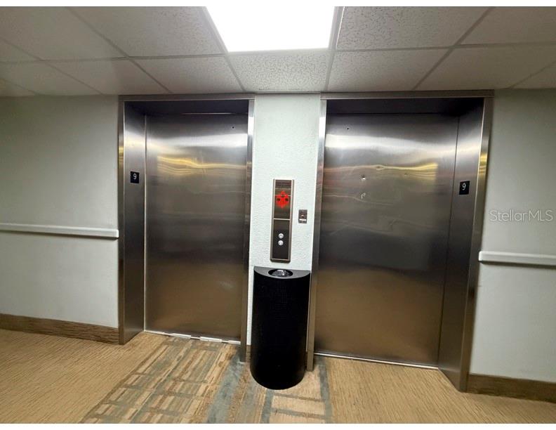 6165 Carrier Drive, Unit 1903 Orlando, FL 32819 - Photo 19 of 21 a bathroom with a shower