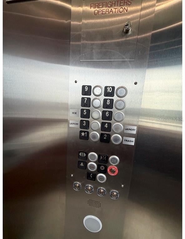 6165 Carrier Drive, Unit 1903 Orlando, FL 32819 - Photo 20 of 21 a view of a refrigerator in kitchen and a stove