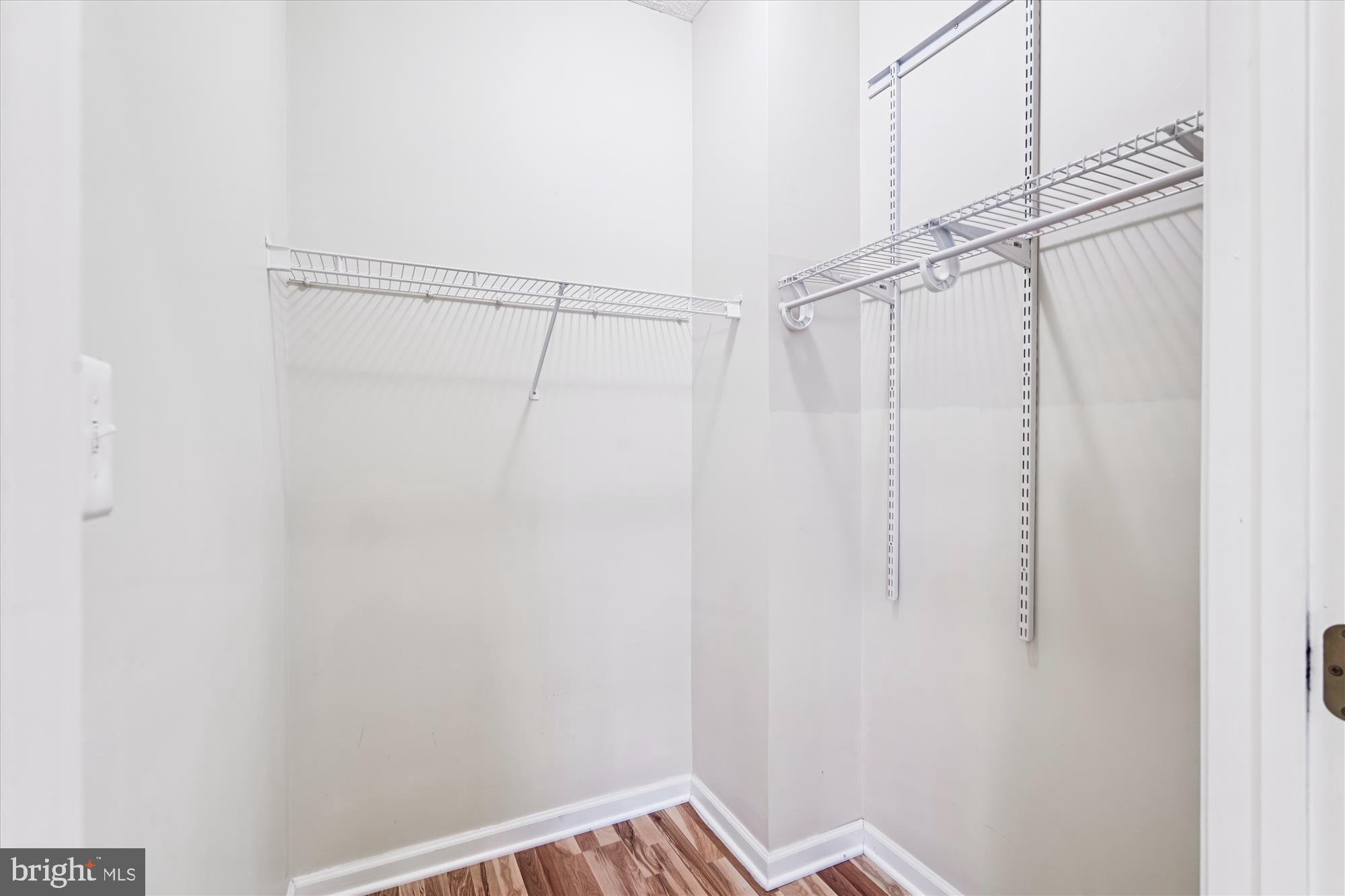 2412 Chestnut Terrace Court, Unit 104 Odenton, MD 21113 - Photo 21 of 42 a view of a room with racks on the wall