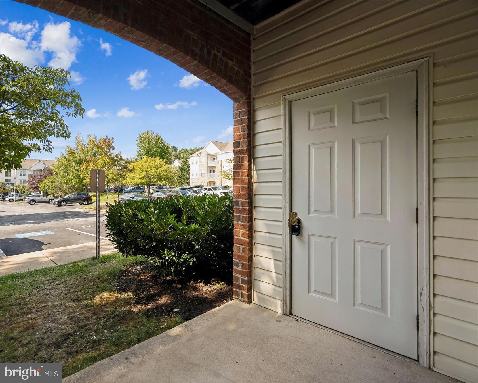2412 Chestnut Terrace Court, Unit 104 Odenton, MD 21113 - Photo 22 of 42 a view of a entrance gate of the house