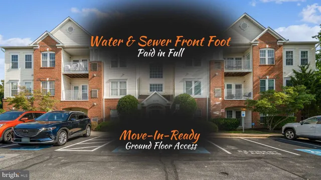 a view of a play house with a yard and potted plants