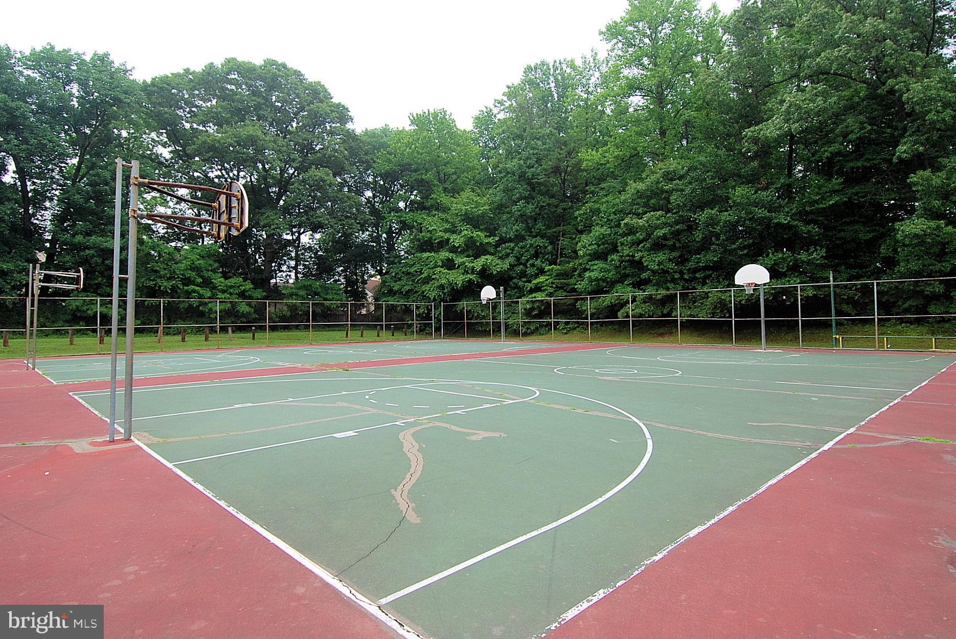 2412 Chestnut Terrace Court, Unit 104 Odenton, MD 21113 - Photo 33 of 42 a view of a tennis court