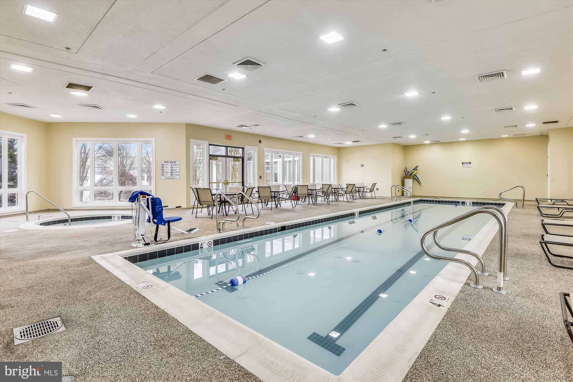 2412 Chestnut Terrace Court, Unit 104 Odenton, MD 21113 - Photo 37 of 42 a large kitchen with stainless steel appliances lots of counter space and a sink