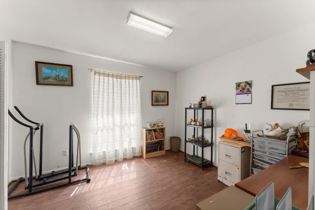 a view of a livingroom with furniture and room