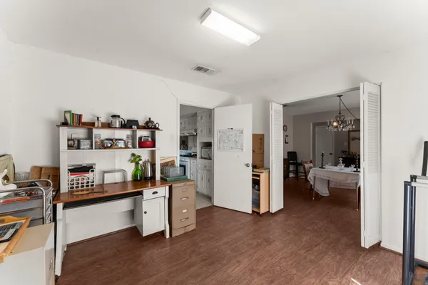 a bedroom with furniture and a view of bedroom