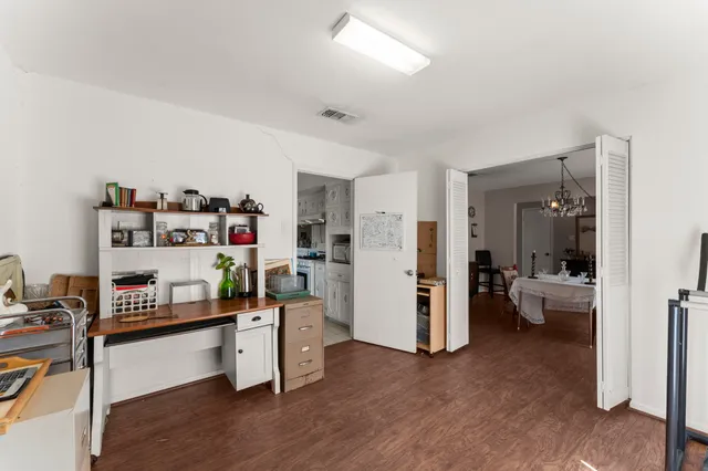 a bedroom with furniture and a view of bedroom
