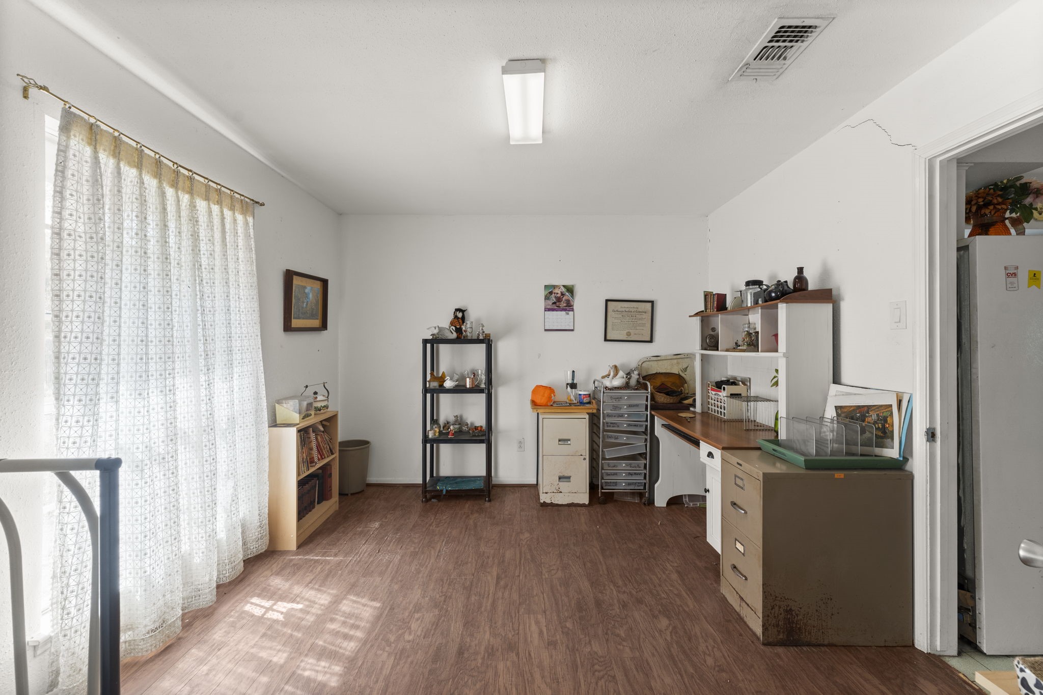 2003 Pinewoods Way Spring, TX 77386 - Photo 14 of 50 a view of a room with and wooden floor