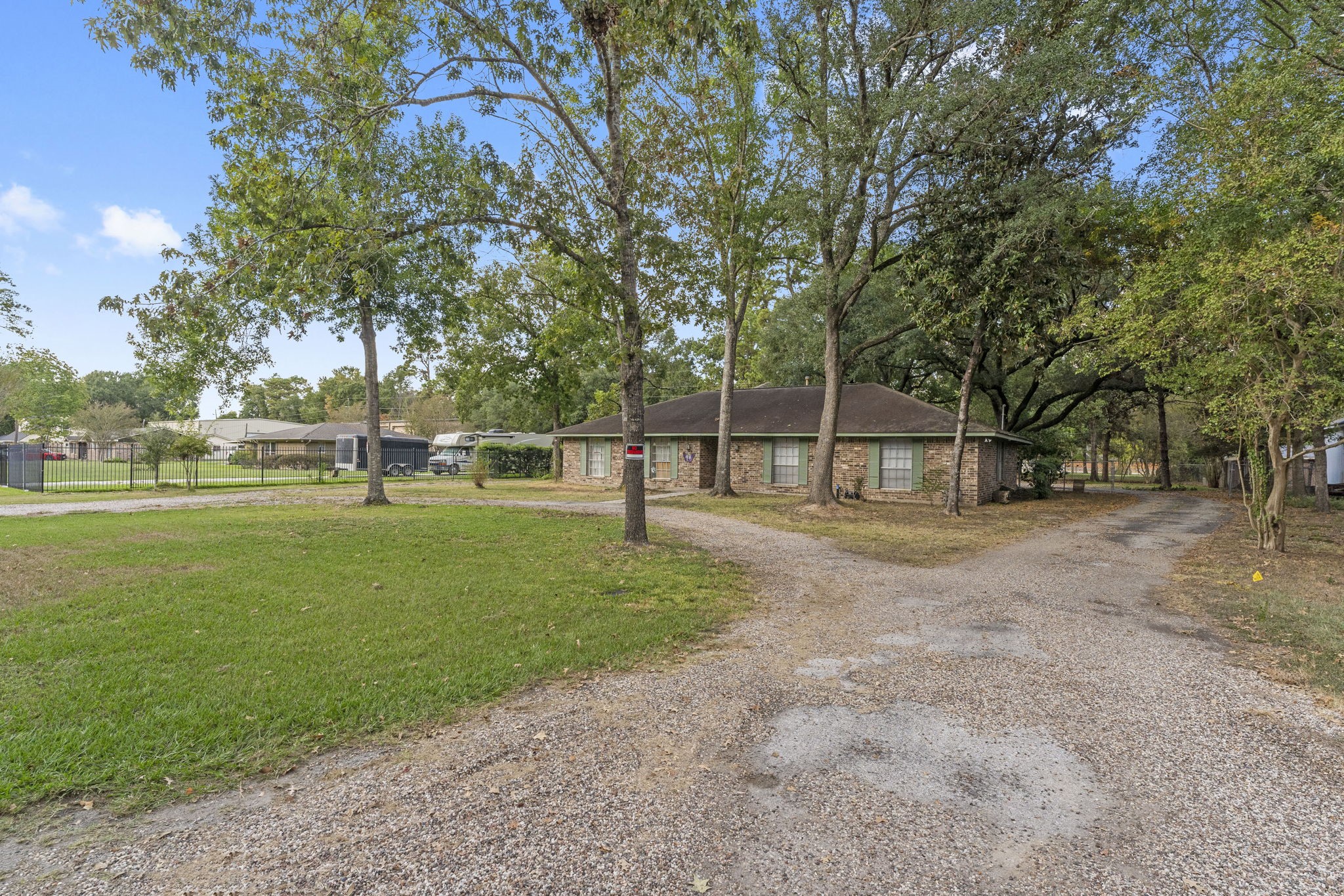 2003 Pinewoods Way Spring, TX 77386 - Photo 2 of 50 a view of a park with large trees