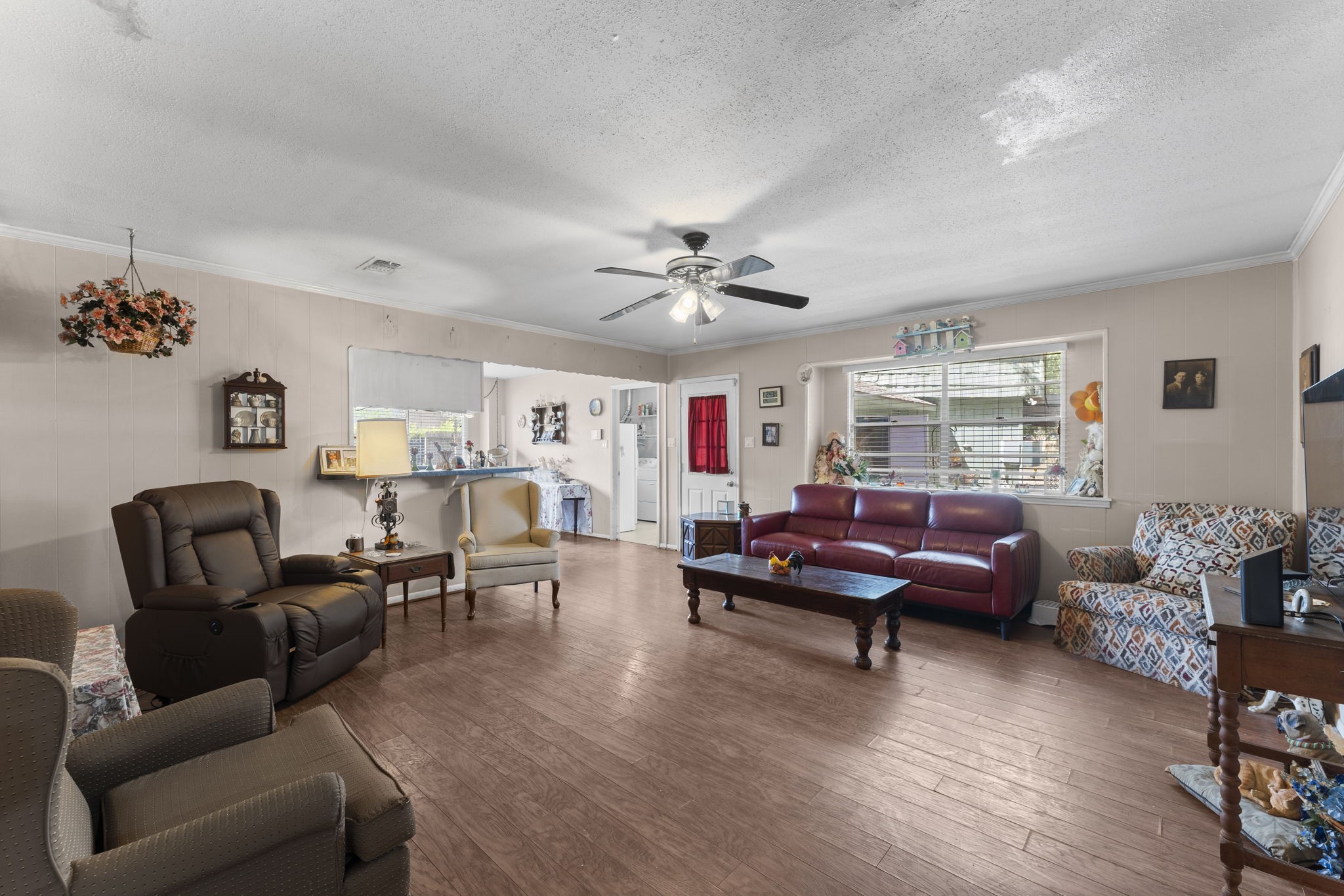 2003 Pinewoods Way Spring, TX 77386 - Photo 23 of 50 a living room with furniture and wooden floor