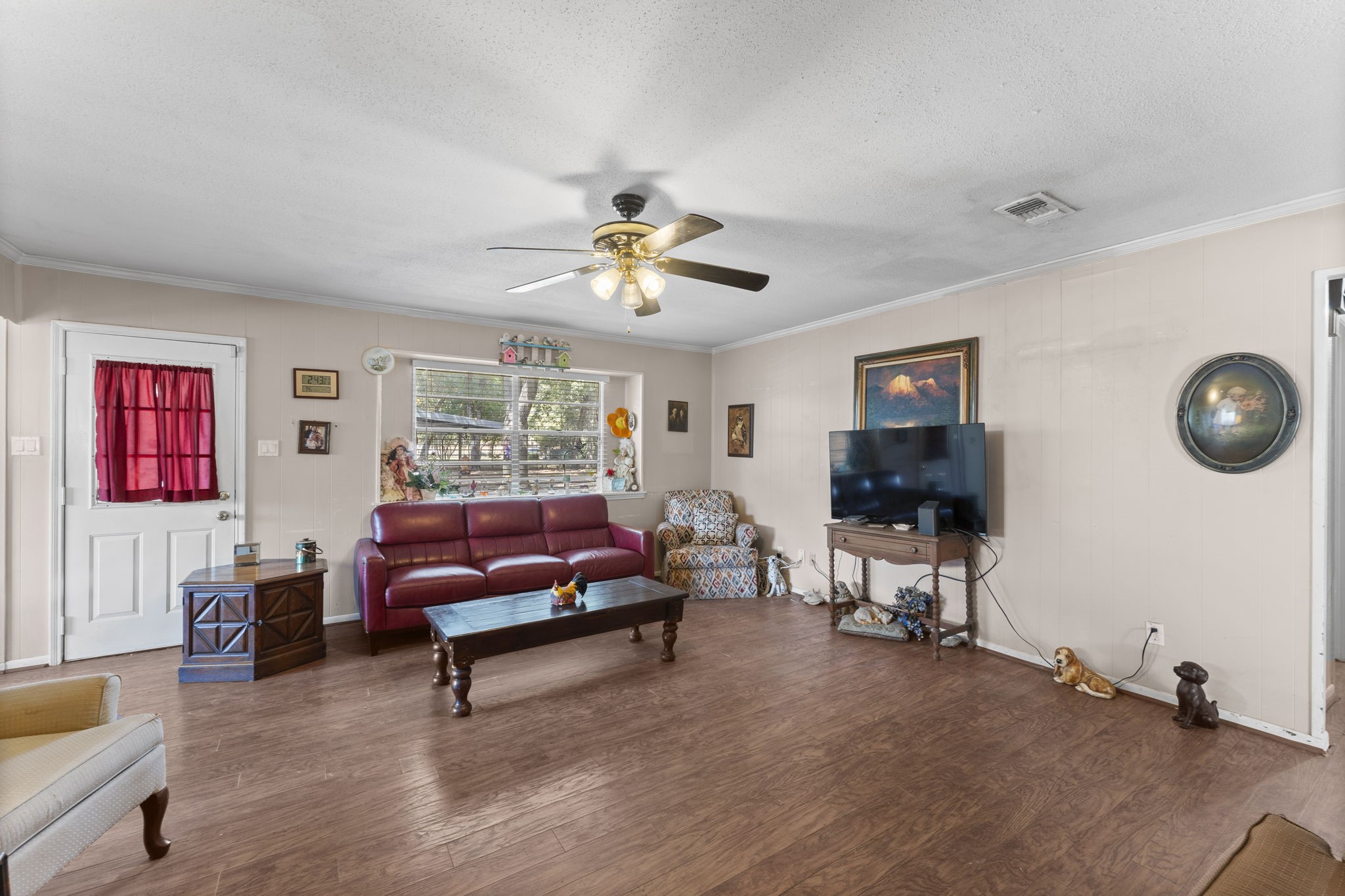 2003 Pinewoods Way Spring, TX 77386 - Photo 24 of 50 a living room with furniture and a flat screen tv