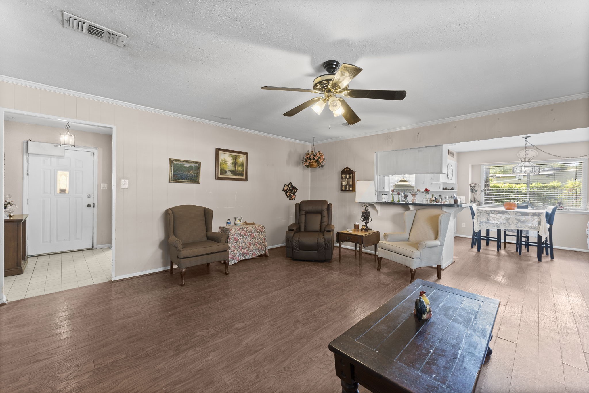 2003 Pinewoods Way Spring, TX 77386 - Photo 25 of 50 a living room with furniture and wooden floor