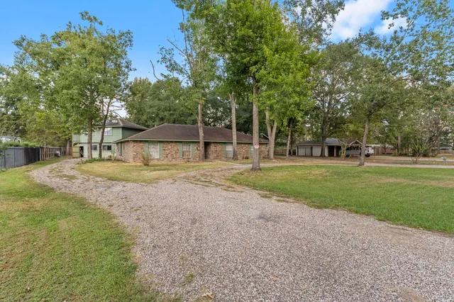 a view of a park with tree s