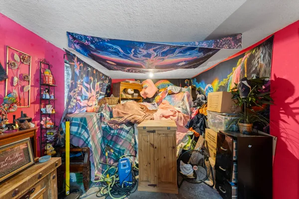 a view of entryway with a lot of stuff