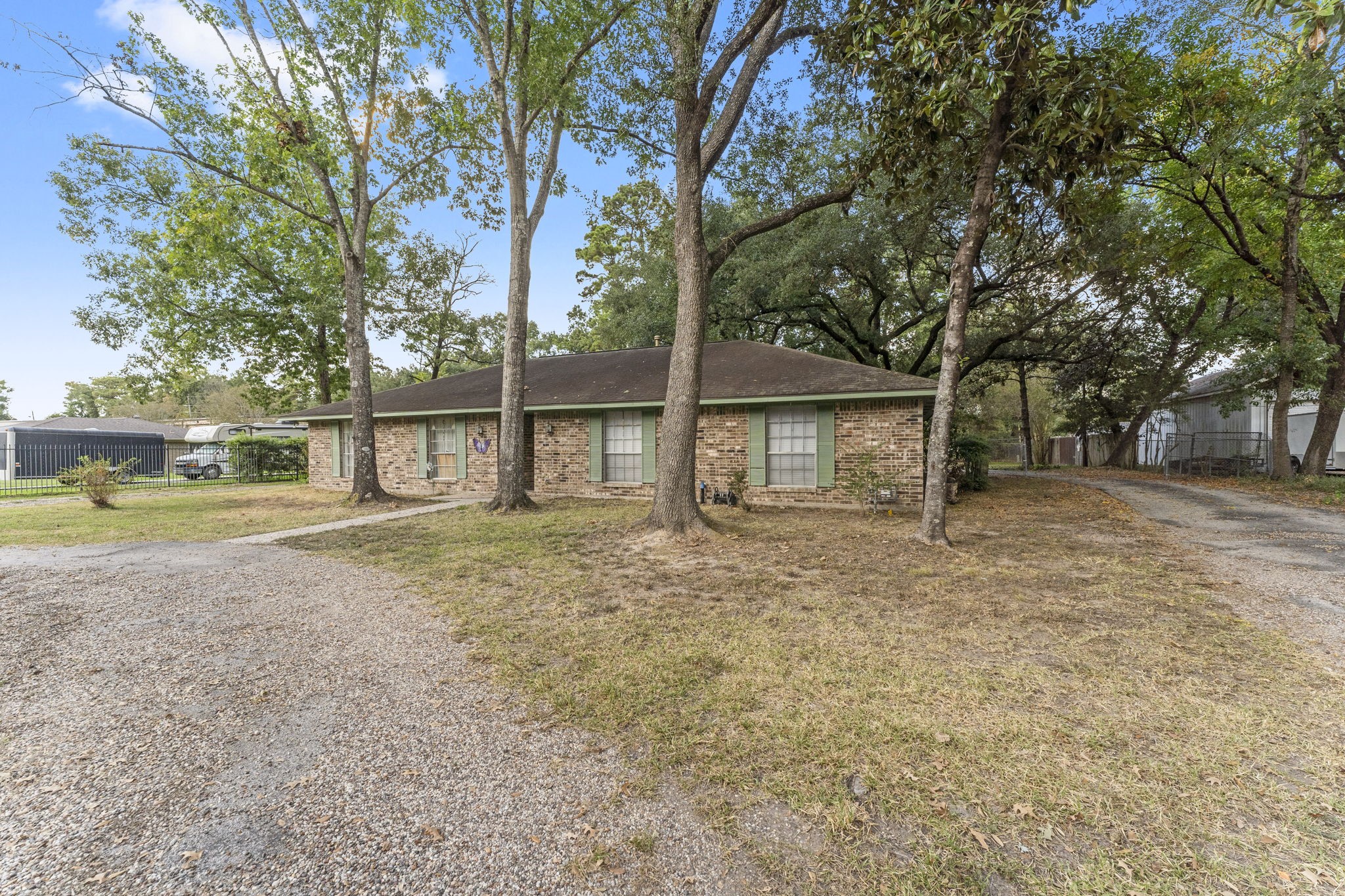 2003 Pinewoods Way Spring, TX 77386 - Photo 6 of 50 front view of a house with a tiny play house