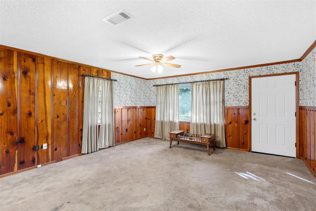 1227 McLennan Crossing Road Woodway, TX 76712 - Photo 13 of 30 a view of an empty room with a window