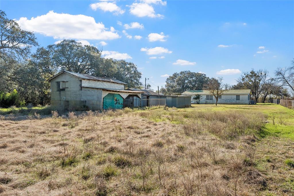 1227 McLennan Crossing Road Woodway, TX 76712 - Photo 22 of 30 a view of backyard with green space