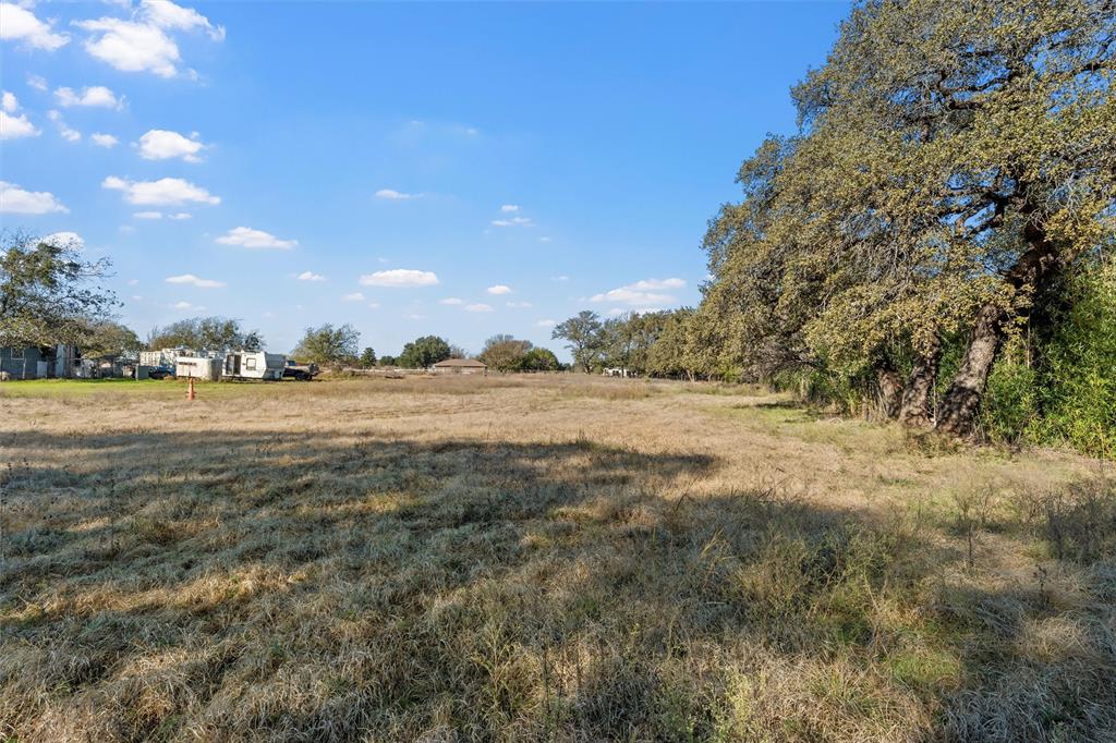 1227 McLennan Crossing Road Woodway, TX 76712 - Photo 23 of 30 a view of yard with ocean and trees around