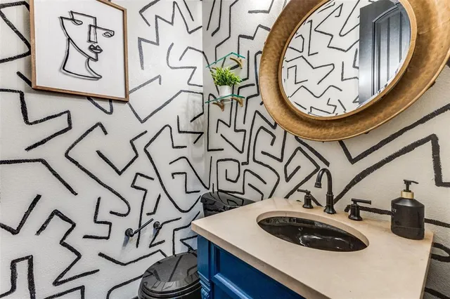 a kitchen with a stove and cabinets