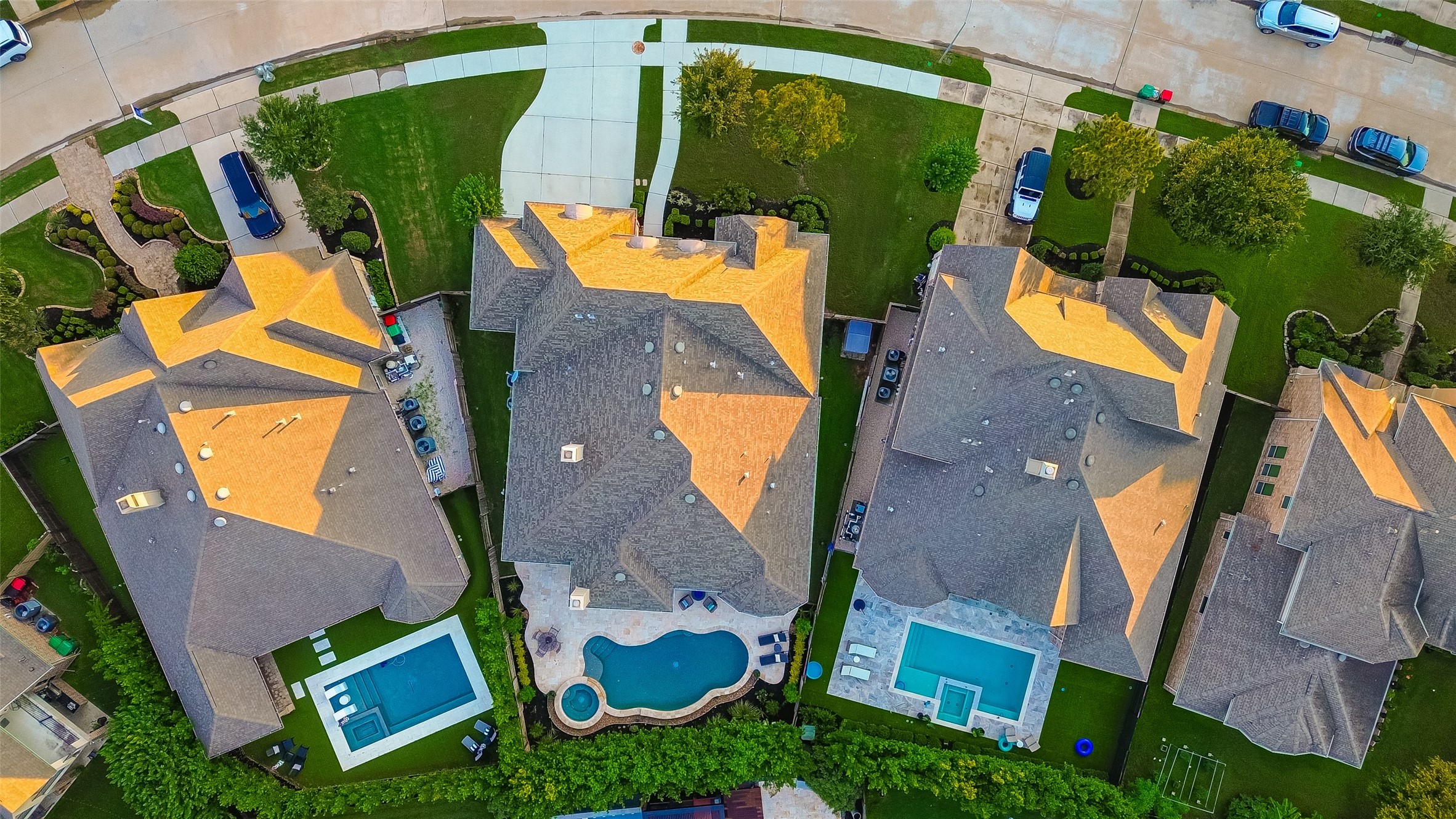 2803 Mayfield Ridge Lane Katy, TX 77494 - Photo 2 of 40 Enjoy this self cleaning Heated and Chilled Pool year round. Surrounded by travertine decking & luscious landscaping...this is the perfect space to relax and entertain!
