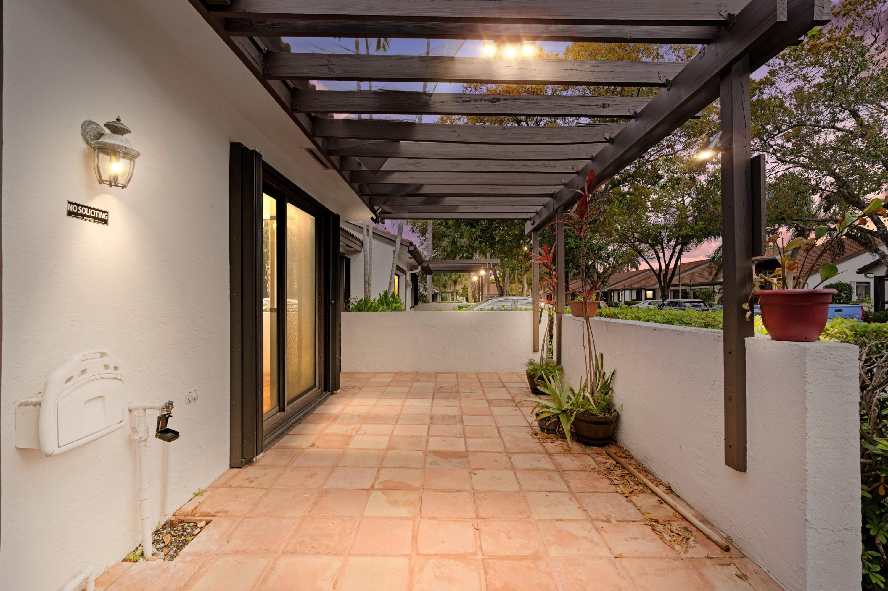 7227 Solandra Lane Fort Lauderdale, FL 33321 - Photo 3 of 17 Twilight Patio