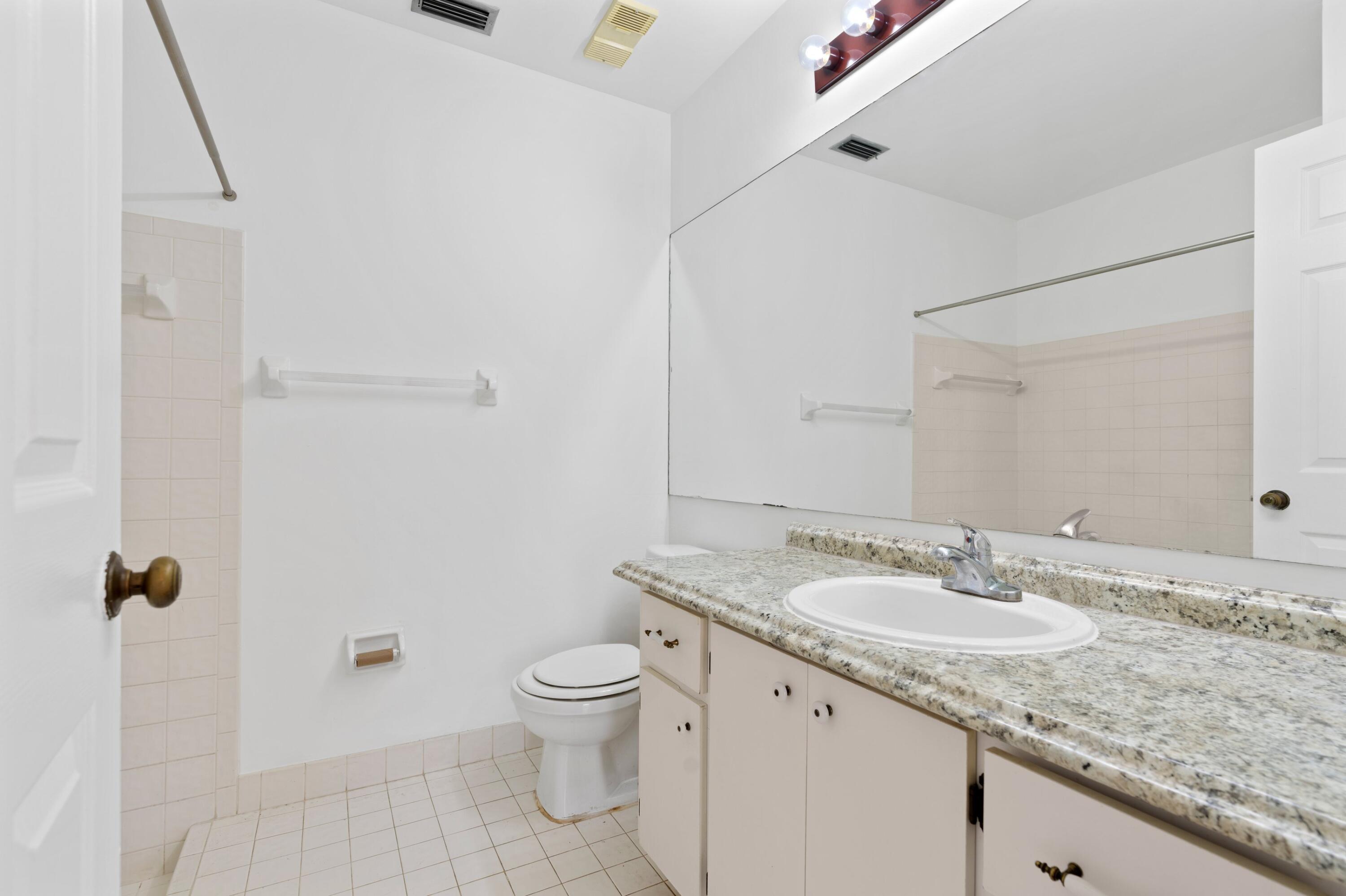 7227 Solandra Lane Fort Lauderdale, FL 33321 - Photo 8 of 17 Primary Bathroom