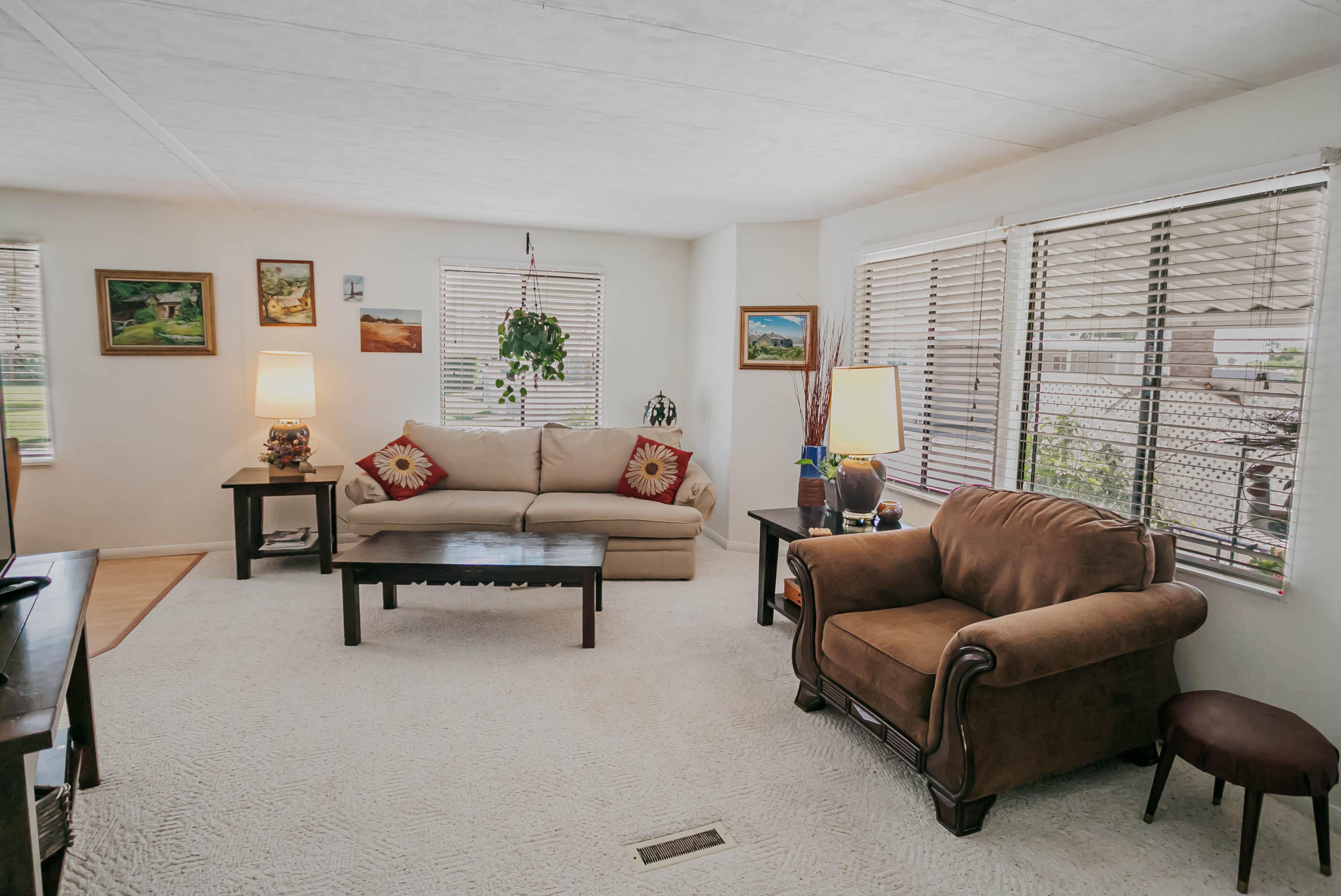 51555 Monroe Street, Unit 26 Indio, CA 92201 - Photo 16 of 54 a living room with furniture and a window
