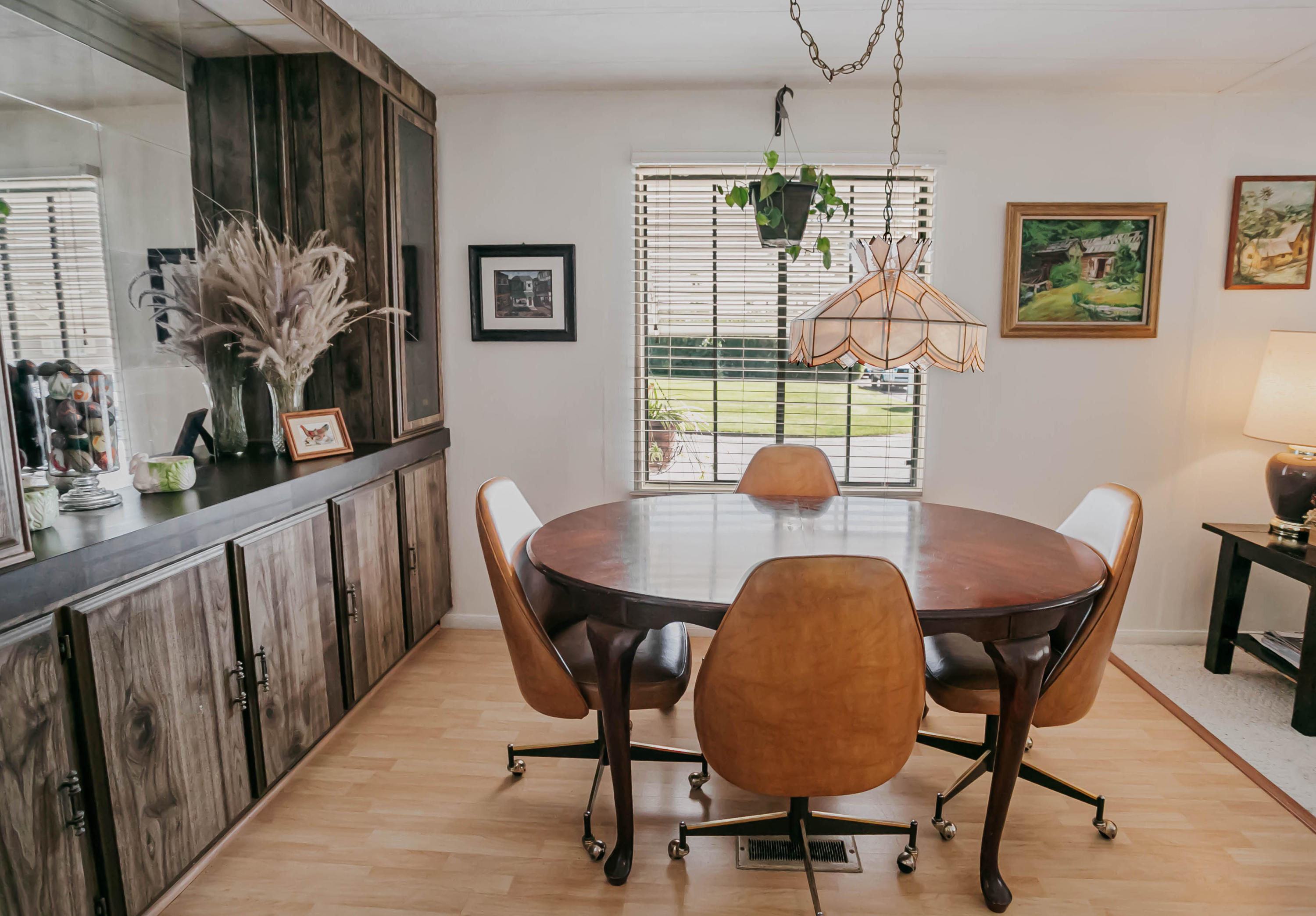 51555 Monroe Street, Unit 26 Indio, CA 92201 - Photo 18 of 54 a view of a dining room with furniture window and wooden floor