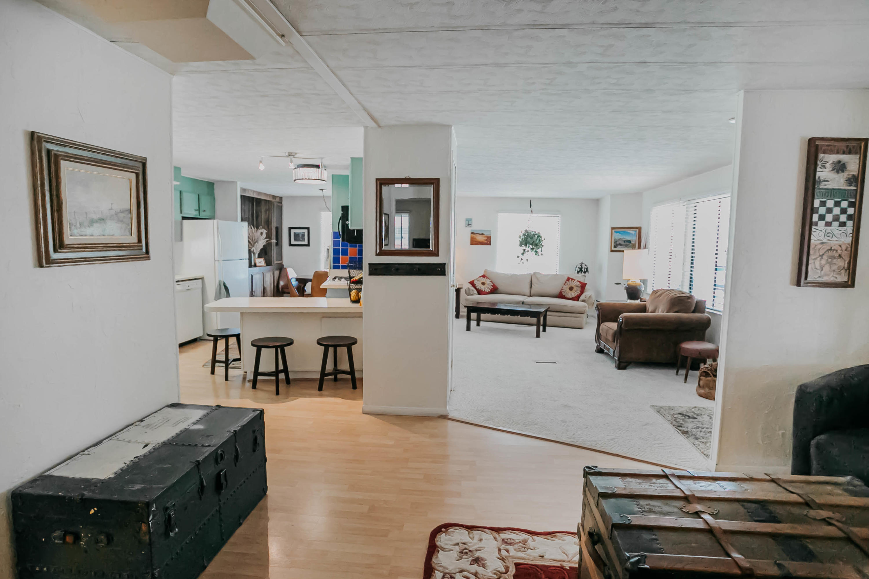 51555 Monroe Street, Unit 26 Indio, CA 92201 - Photo 29 of 54 a living room with furniture and a flat screen tv