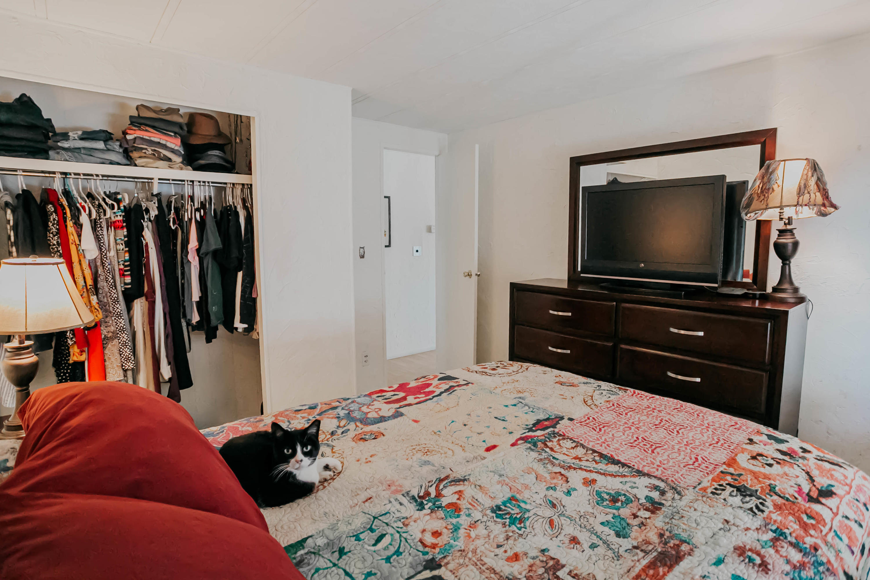 51555 Monroe Street, Unit 26 Indio, CA 92201 - Photo 31 of 54 a bedroom with a bed and a flat screen tv
