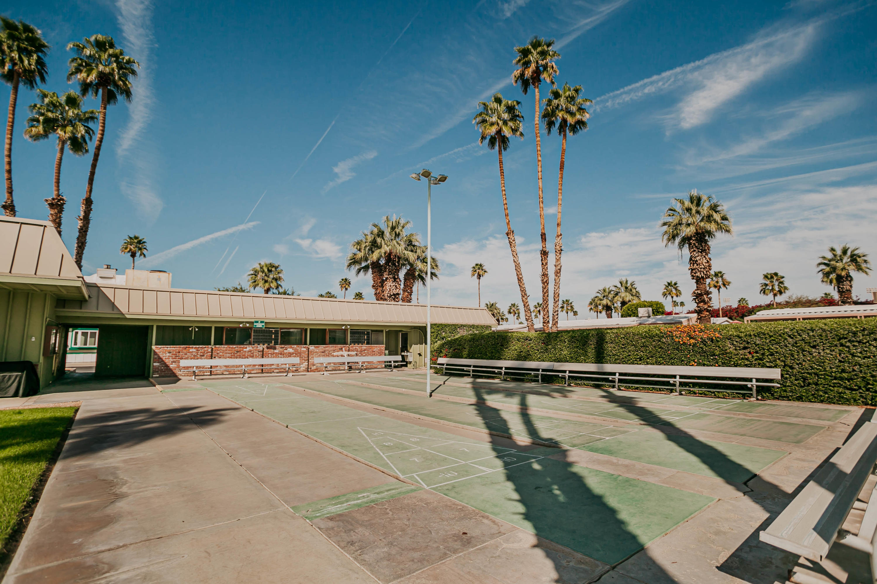 51555 Monroe Street, Unit 26 Indio, CA 92201 - Photo 47 of 54 a view of a swimming pool with outdoor seating