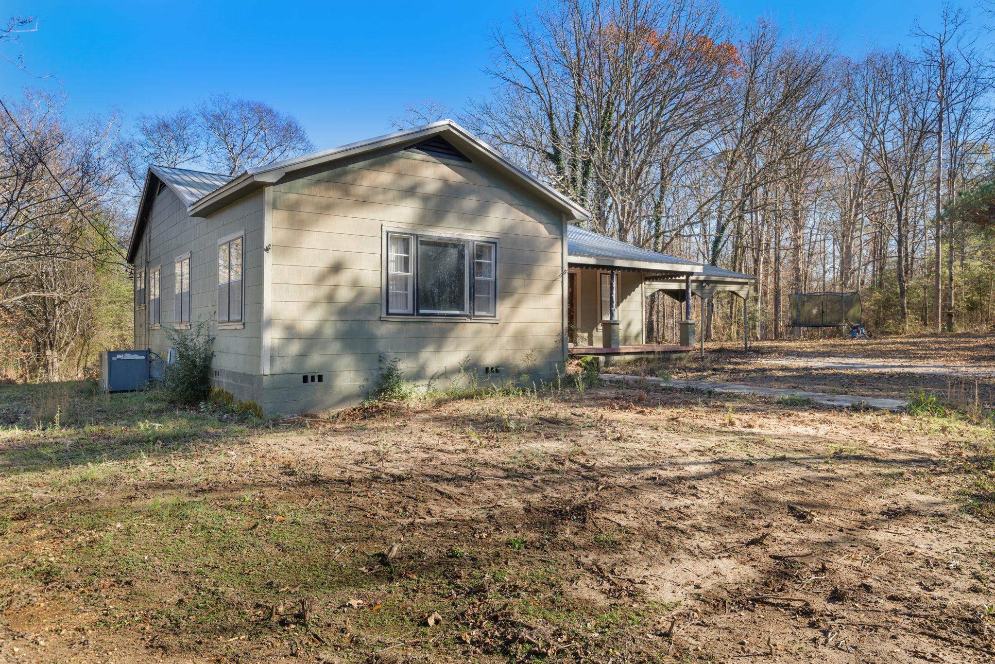10 County Road 440 Iuka, MS 38852 - Photo 20 of 40 a front view of a house with a yard