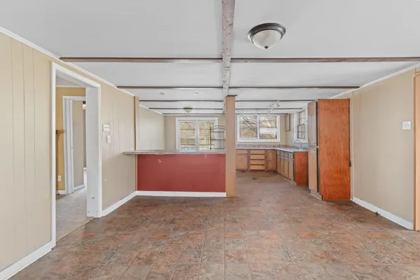 a view of a city with lush green forest