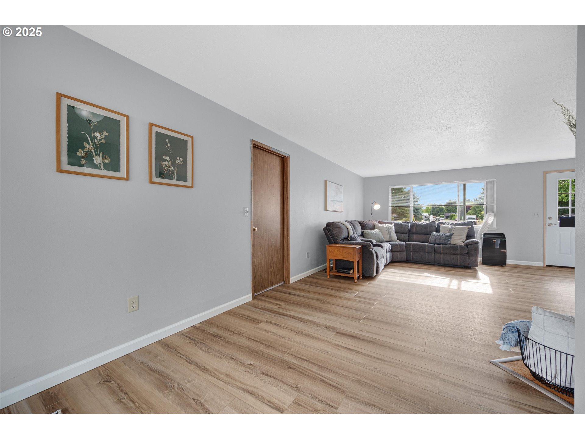 4591 Juliana Loop Southeast Salem, OR 97317 - Photo 17 of 32 a view of a livingroom with furniture and wooden floor