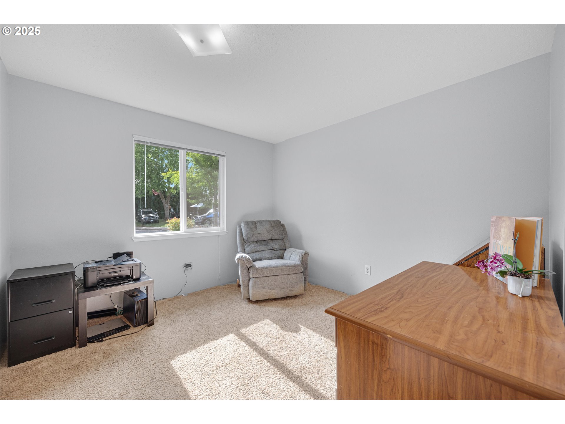 4591 Juliana Loop Southeast Salem, OR 97317 - Photo 27 of 32 a bedroom with furniture and a window