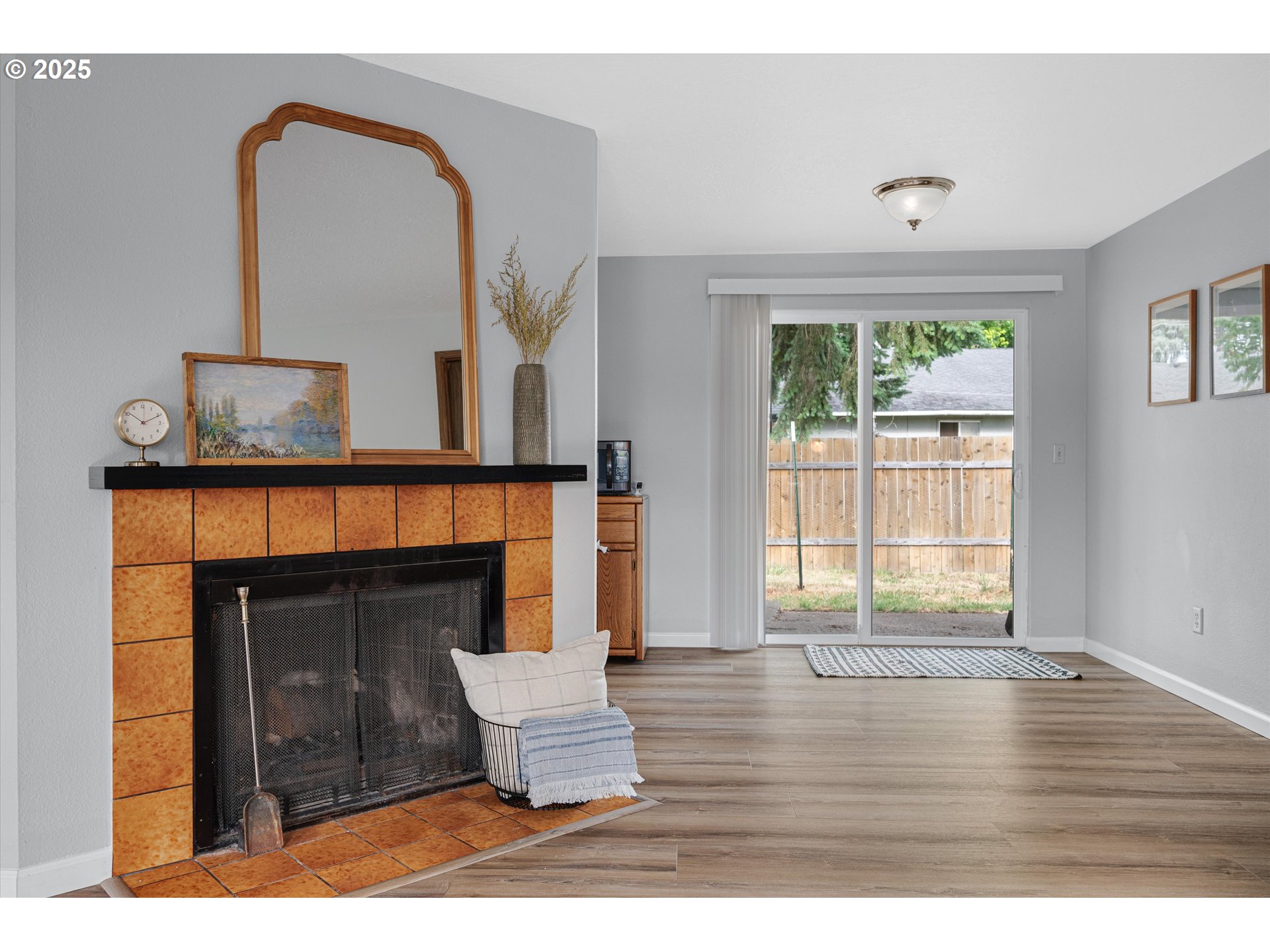4591 Juliana Loop Southeast Salem, OR 97317 - Photo 5 of 32 a living room with furniture and a fireplace