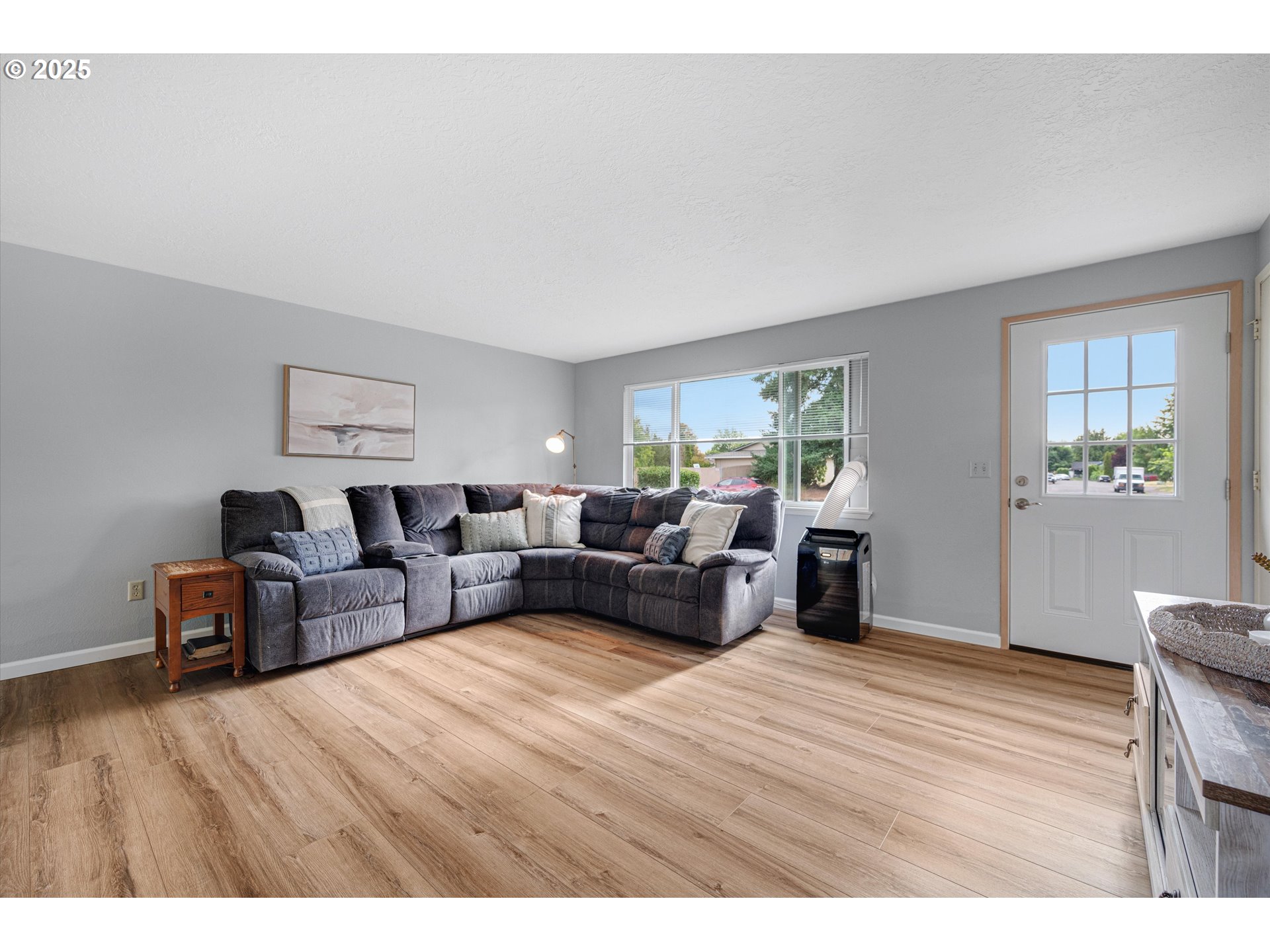 4591 Juliana Loop Southeast Salem, OR 97317 - Photo 8 of 32 a living room with furniture wooden floor and window