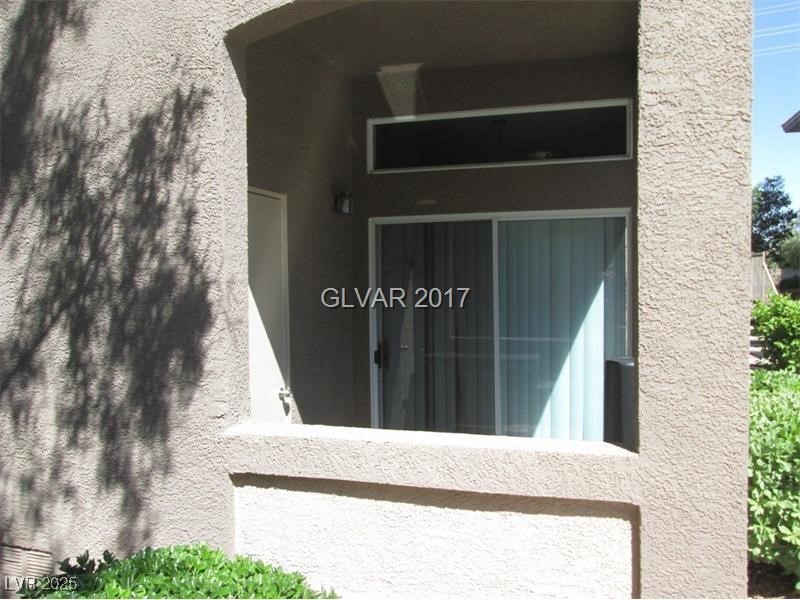 3411 Cactus Mountain Street, Unit 103 Las Vegas, NV 89129 - Photo 8 of 20 Entrance to property with stucco siding