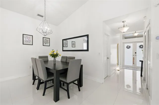 a view of a dining room with furniture