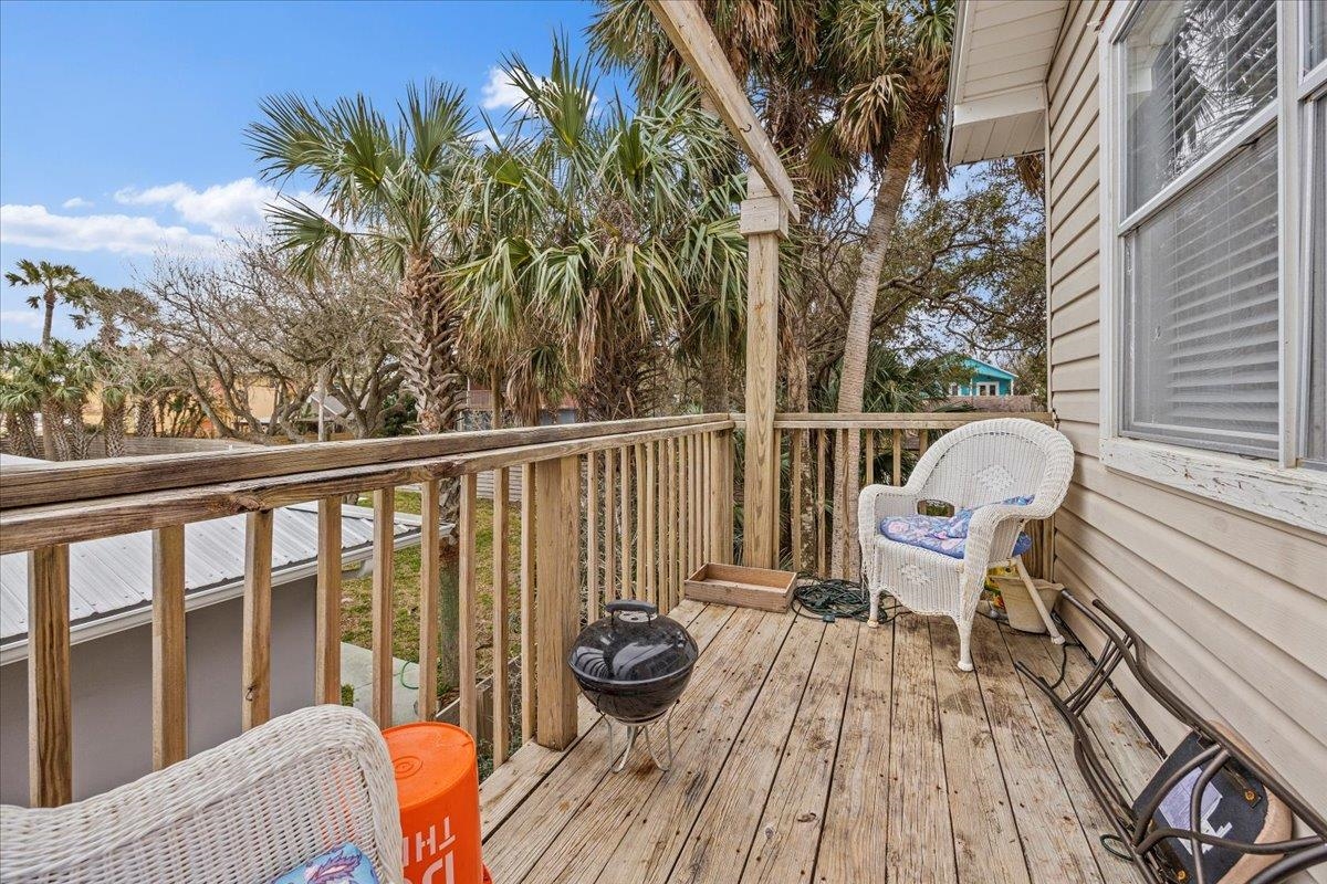 111 A Street St. Augustine Beach, FL 32080 - Photo 16 of 17 a view of a two chairs in the deck