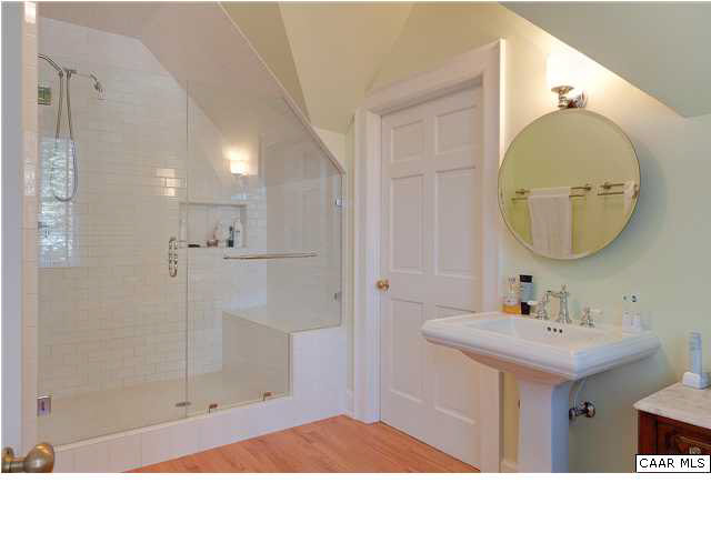 1325 Rugby Road Charlottesville, VA 22903 - Photo 19 of 29 Second floor master bath - beautiful new subway tile shower. All new fixtures. There is a large room adjacent to the bathroom that could be a walk-in closet