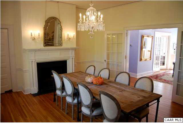1325 Rugby Road Charlottesville, VA 22903 - Photo 5 of 29 The formal dining room features a fireplace with antique mantel, refinished hardwood floors, restored french doors.