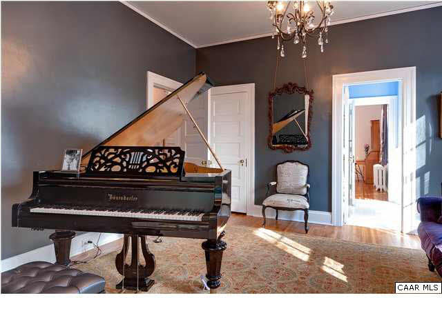 1325 Rugby Road Charlottesville, VA 22903 - Photo 8 of 29 The east facing music room includes refinished hardwood floors and restored french doors.