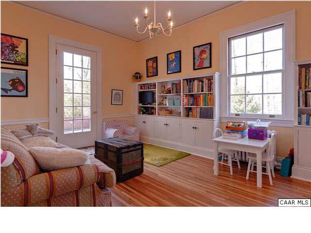 1325 Rugby Road Charlottesville, VA 22903 - Photo 10 of 29 Den with built-ins. French door leads to rear terrace